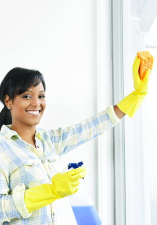 Woman Cleaning Window